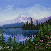 Beautiful Mt. Rainier and Reflection Lake on a foggy day with trees and flowers.